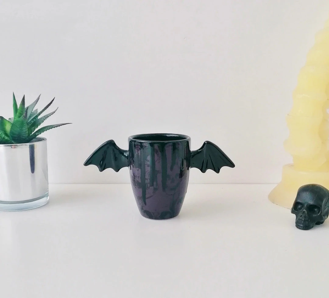 Weird & Wonderful Ceramics Purple Skull Wing Mug New Arrivals 3 Weird & Wonderful Ceramics Purple Skull Wing Mug New Arrivals